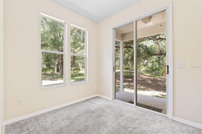 11933 Pasco Trails Blvd, House other with 4 bedrooms, 3 bathrooms and null parking in SPRING HILL FL | Image 20