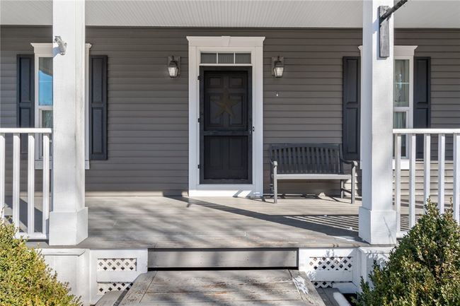 The front porch entrance - great porch space that will hold ALL of your guests! | Image 13