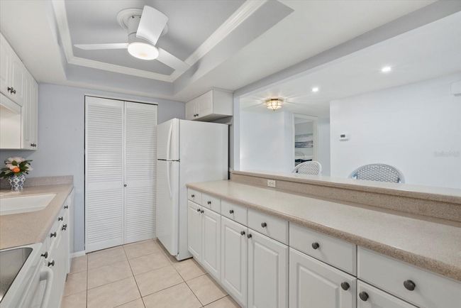 Kitchen looking toward the front of the unit | Image 9
