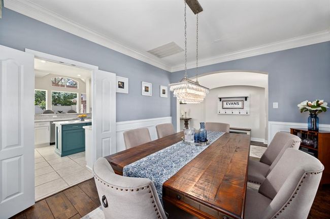 Formal dining room is located off the front entry and conveniently connects to the ktichen. | Image 22