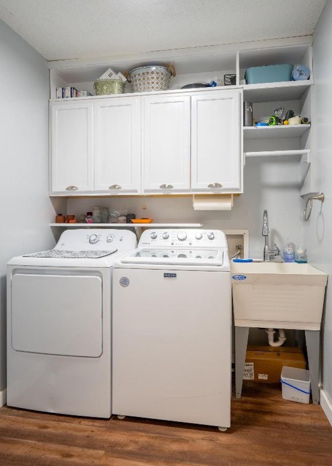Remodeled laundry room with sink. | Image 14
