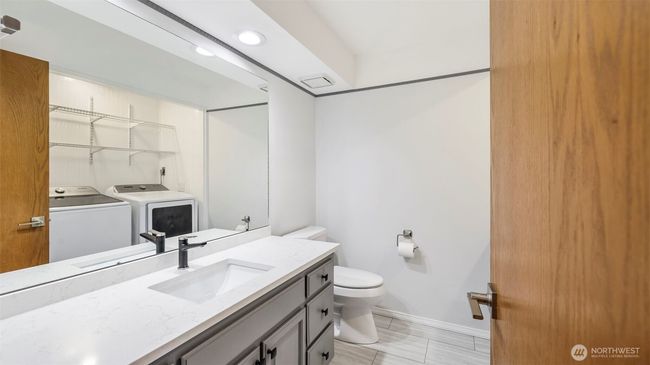 Main floor powder/utility room. | Image 17