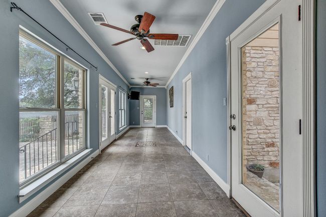 This is a bonus area with tons of natural light was used as an office. Door to private courtyard | Image 16