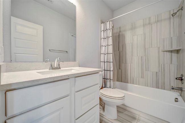 Adjacent bathroom. | Image 25