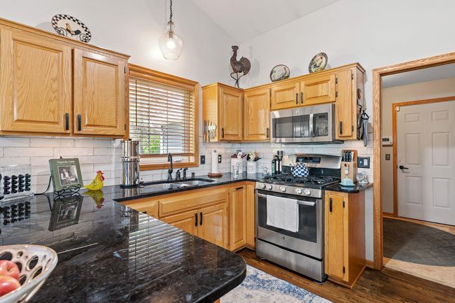 Stainless steel appliances and the cabinets are still like new! | Image 25
