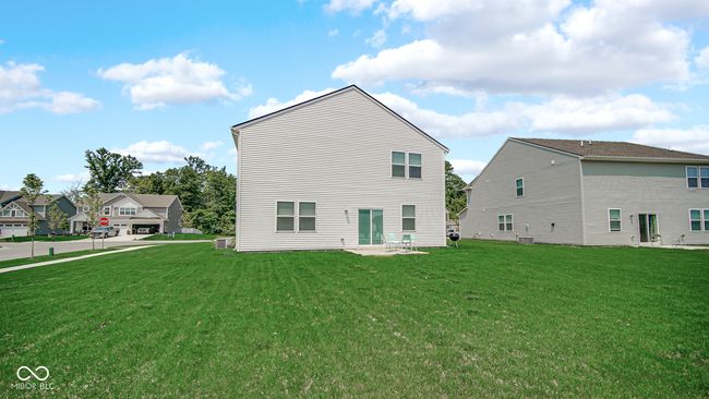 back of property with a yard and a patio area | Image 36