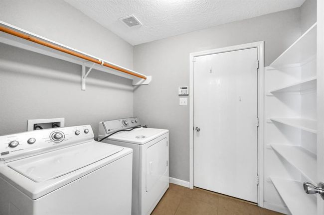 Utility room inside home. *Washer and Dryer are not included in the same, no longer located at the home. | Image 10