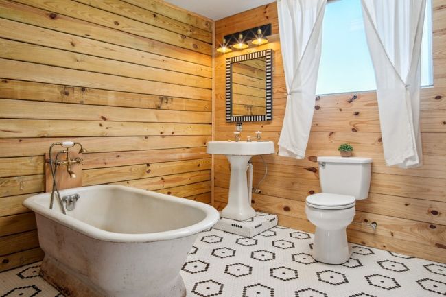 Soak a while. Stay a while. The bathroom is located in the primary bedroom - it's all one big, undivided room. | Image 10