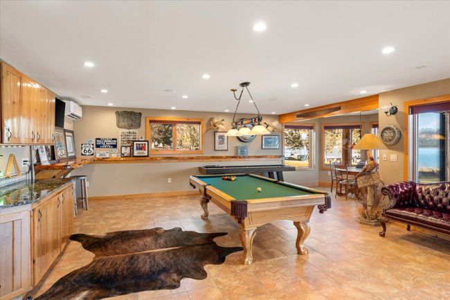 Lower level family area, entertaining, game, living room. | Image 65