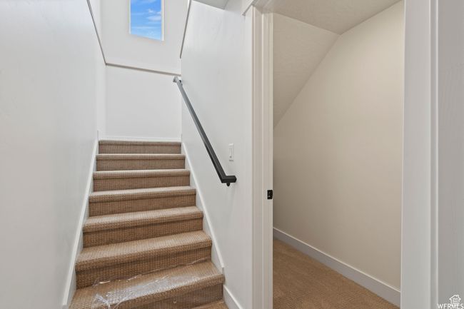 Stairs featuring carpet and baseboards | Image 22