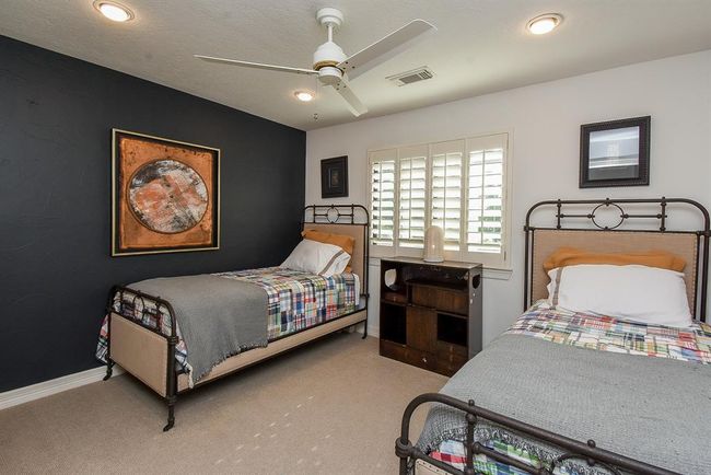 The third secondary bedroom is another nice sized room. It shares a bathroom with the 4th secondary bedroom. | Image 38
