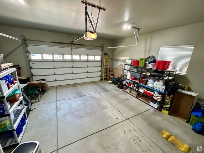 Garage featuring a garage door opener | Image 22