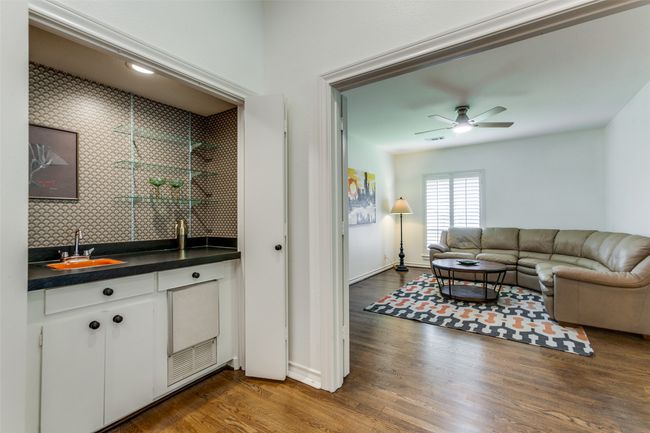 This retro bar will make you and your friends smile! Step into the den which can be closed off so the kids can watch tv while the grownups "Adult"! | Image 6