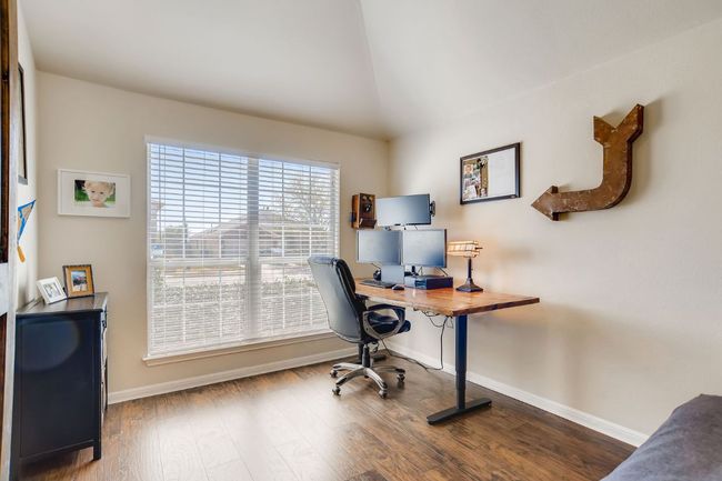 Home office featuring baseboards and wood finished floors | Image 5