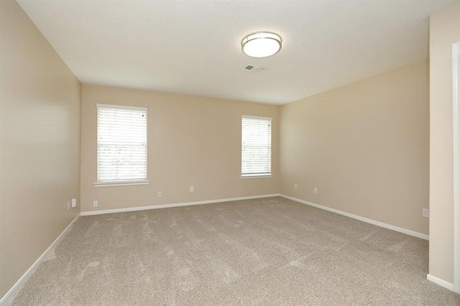 New carpet throughout the upstairs. This is the game room. | Image 19