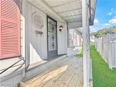 Property entrance featuring a lawn | Image 2