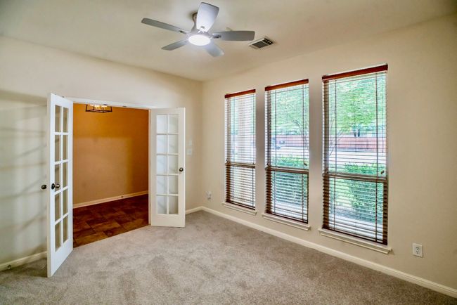 The office is located at the front of house off foyer. | Image 5
