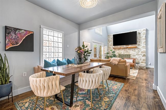 Dining space with baseboards and dark wood-style flooring | Image 7