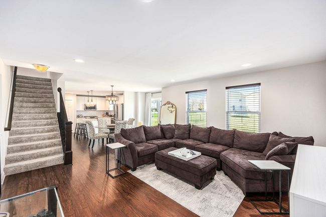 open family room looking into kitchen | Image 11