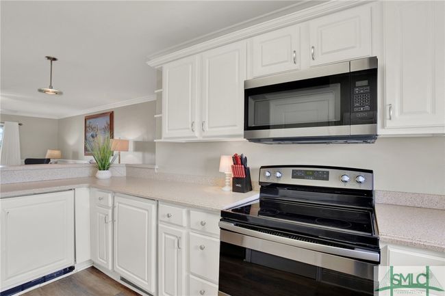 Updated Kitchen with Stainless Steel Appliances & Breakfast Bar | Image 16
