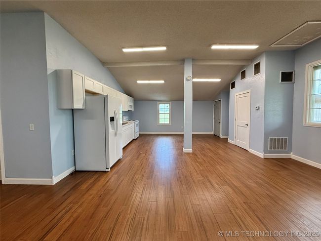 Kitchen view from bedrooms on the left | Image 4