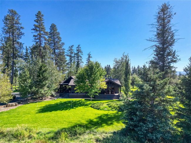 View of front of house from courtyard. | Image 7