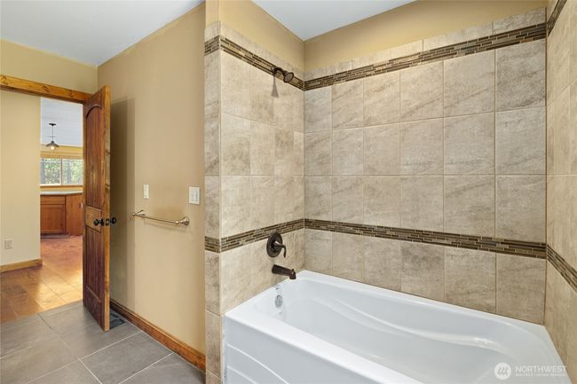 Perfect soaking tub to relax in after a long day of play! | Image 11