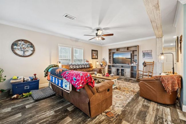 Stepping inside, you'll note the high ceilings, low maintenance flooring, spacious rooms and more! | Image 7