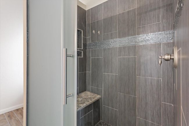 Bathroom featuring tiled shower | Image 22