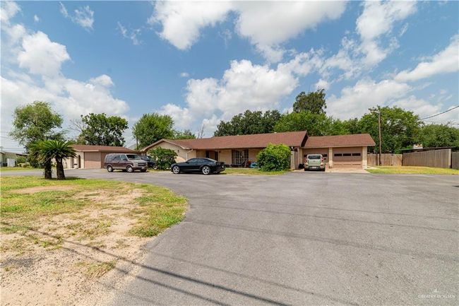 View of front of home featuring a garage | Image 10