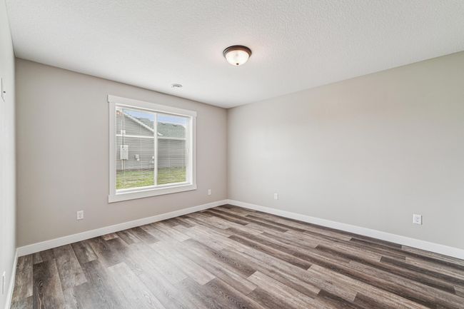 Another view of the third bedroom. | Image 19