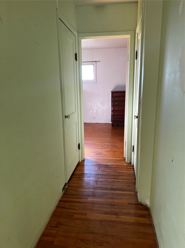 Hall with dark wood-type flooring | Image 62