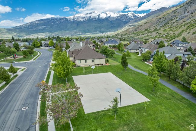 Aerial view of property and surrounding area featuring nearby suburban area and a mountainous background | Image 47