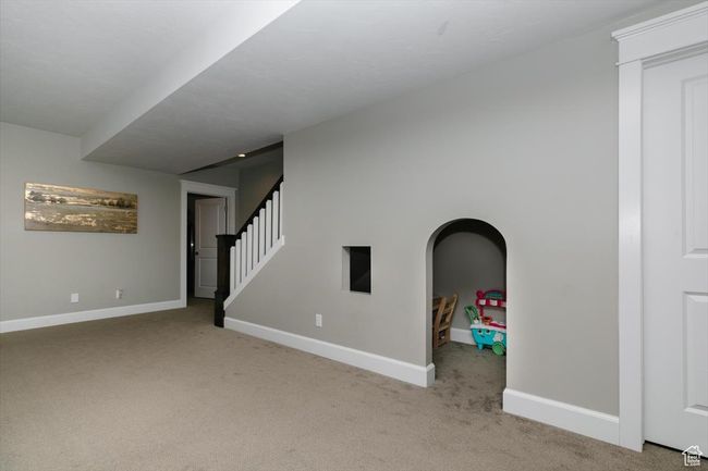 Interior space with carpet floors and baseboards | Image 61