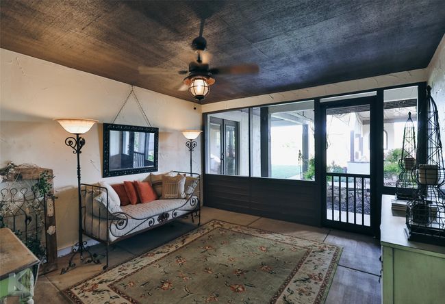 Screened in room that could be used for may things. | Image 12