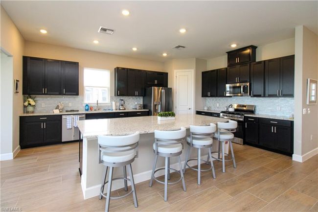 15765 Cortina St, House other with 4 bedrooms, 3 bathrooms and null parking in Naples FL | Image 29