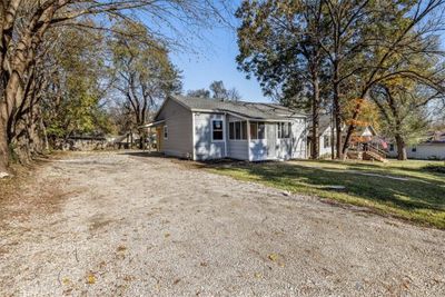 Bungalow-style home with a front lawn | Image 2