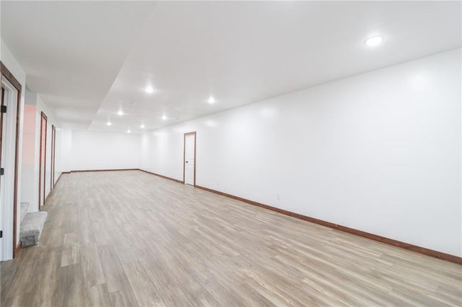 Spare room with light hardwood / wood-style floors | Image 36