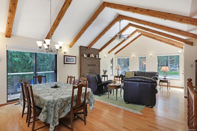 SOLID HARDWOOD FLOORS, VAULTED CEINGS, & TIMBER BEAMS throughout | Image 20