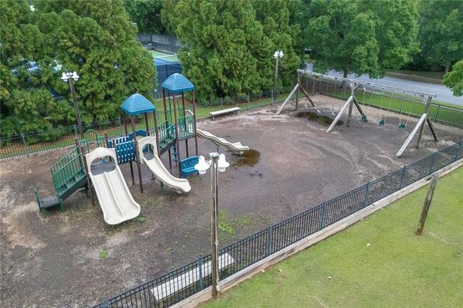 225 Ruby Forest Pkwy, House other with 4 bedrooms, 3 bathrooms and 5 parking in Suwanee GA | Image 59