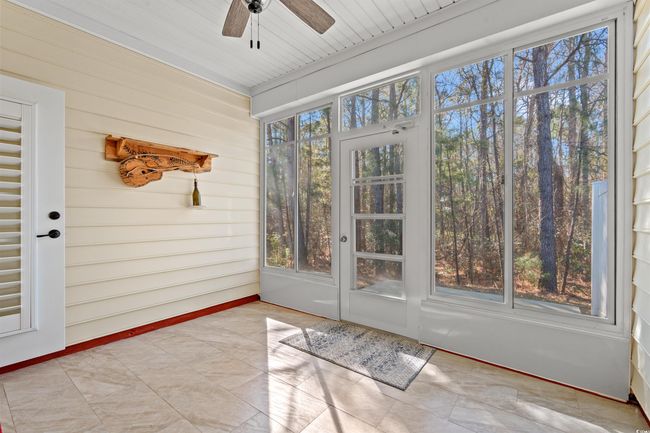 Unfurnished sunroom featuring ceiling fan | Image 23