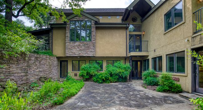 Back of home showcasing courtyard. | Image 32