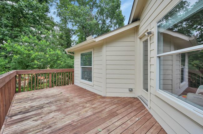 Enjoy outdoor living with a balcony right off the upstairs game room. | Image 37