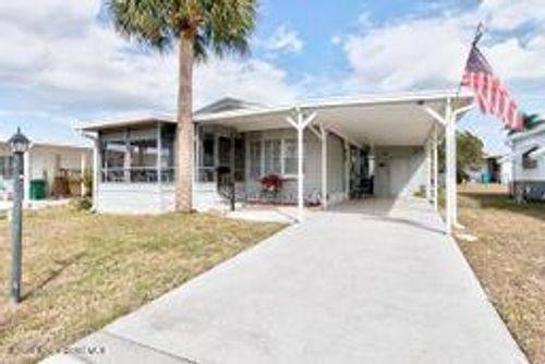 807 Wren Cir, Barefoot Bay, FL, 32976-7506 | Card Image