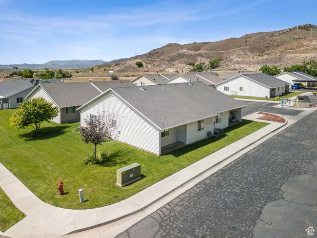 Aerial view of residential area with a mountainous background | Image 33