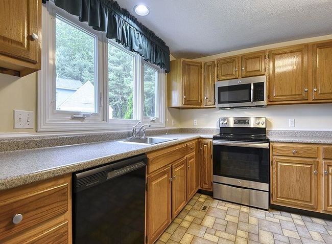 1 Wesley Rd, Condo with 4 bedrooms, 2 bathrooms and null parking in Keene NH | Image 9
