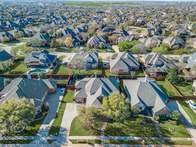 Aerial view of property's location with nearby suburban area | Image 33
