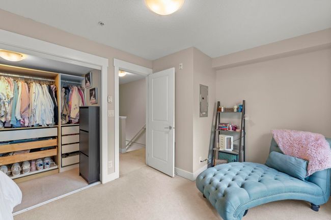 Sitting room with carpet floors, electric panel, and baseboards | Image 17
