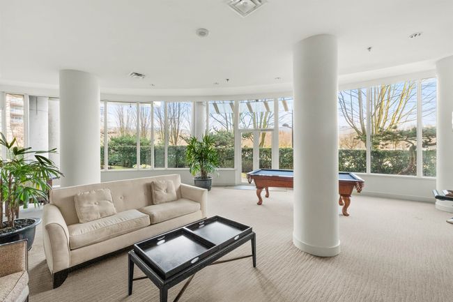 Sunroom / solarium featuring billiards and visible vents | Image 15