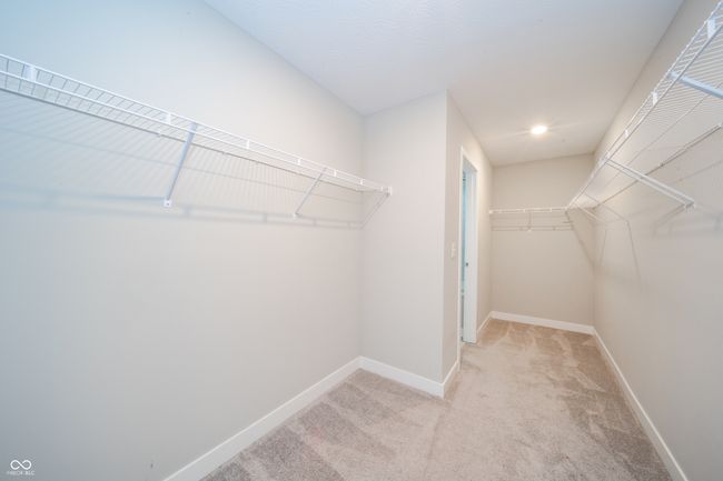 Primary bedroom walk-in closet | Image 17